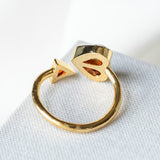 Rock solid stone heart twist ring (ruby/ gold) Size: 7