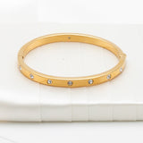 Set In Stone Hinged Bangle (Gold/Clear)