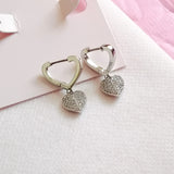 Heart to heart pavé huggies (Silver)