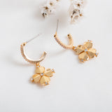 legacy logo spade flower huggies earrings