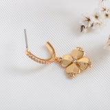 legacy logo spade flower huggies earrings