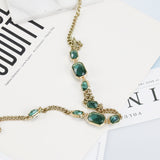 AK gold tone green gemstone necklace