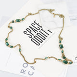 AK gold tone green gemstone necklace