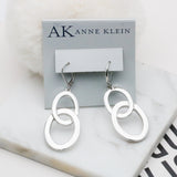 AK silver tone hoops earrings