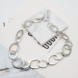 AK silver tone hoops necklace