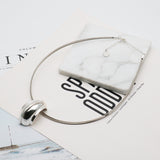 AK silver tone pendant necklace