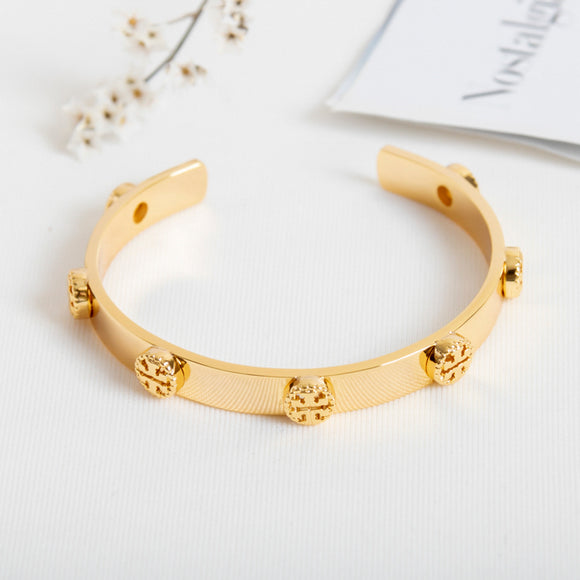 Gold Milgrain Logo Cuff Bracelet