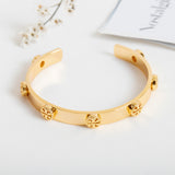 Gold Milgrain Logo Cuff Bracelet